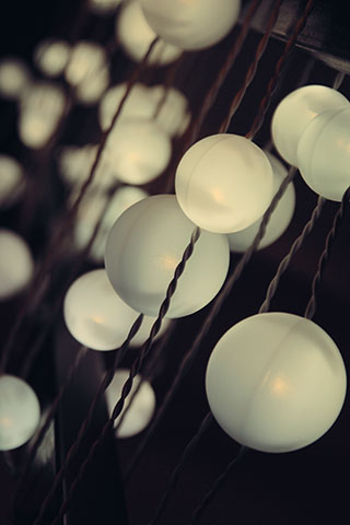 strands of glowing white orbs to represent ideas and curiousity