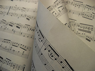 sheet music with a page turning